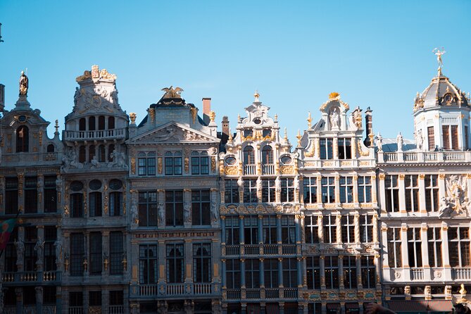 A Self-Guided Tour of Brussels: From Medieval to Modern Times - Walking into UNESCO Grand Place: guild houses, power, and symmetry