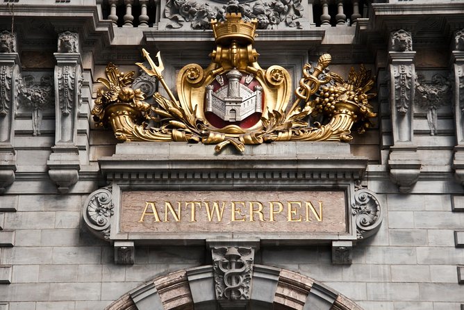 Antwerp and Ghent Day Trip from Brussels With Atomium Photo Stop - Antwerp walking tour: Steen Castle, guild drama, Rubens art, and Meir’s giant hand