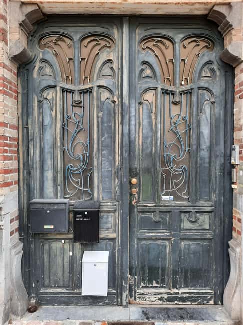Brussels: Art Nouveau Walking Tour with a Local Guide - Cauchie House: The First Real Tease of Belle Époque Whimsy