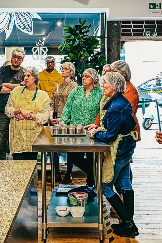 Brussels: Belgian Chocolate Making Workshop with Tastings - Entering the training center: air-conditioned comfort, hairnet rules