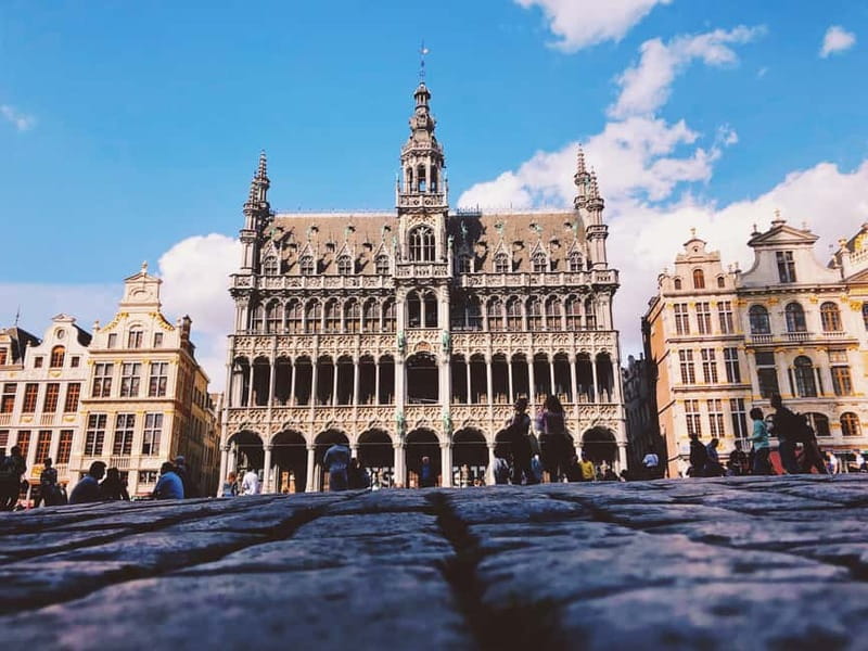 Brussels Highlights: Walking & Bus Tour with Waffle Tasting - Where to Meet: The Blue Umbrella Start