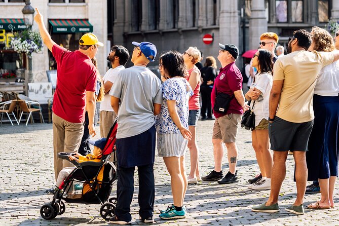 Brussels: Historical Walking Tour with Chocolate & Waffle Tasting - Grand Place: reading City Hall like a local