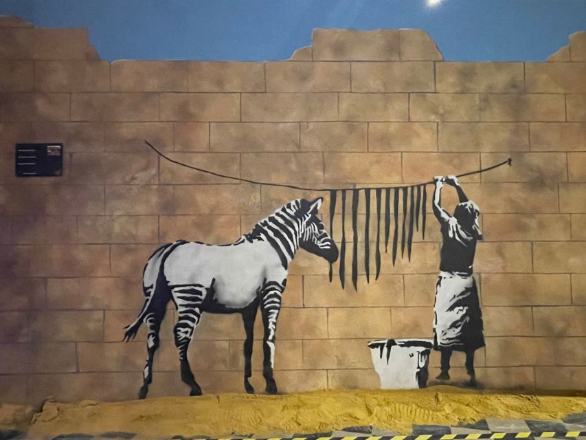 Brussels: The World of Banksy Museum Permanent Exhibition - Real-Size Murals in a Former Fabric House Setting