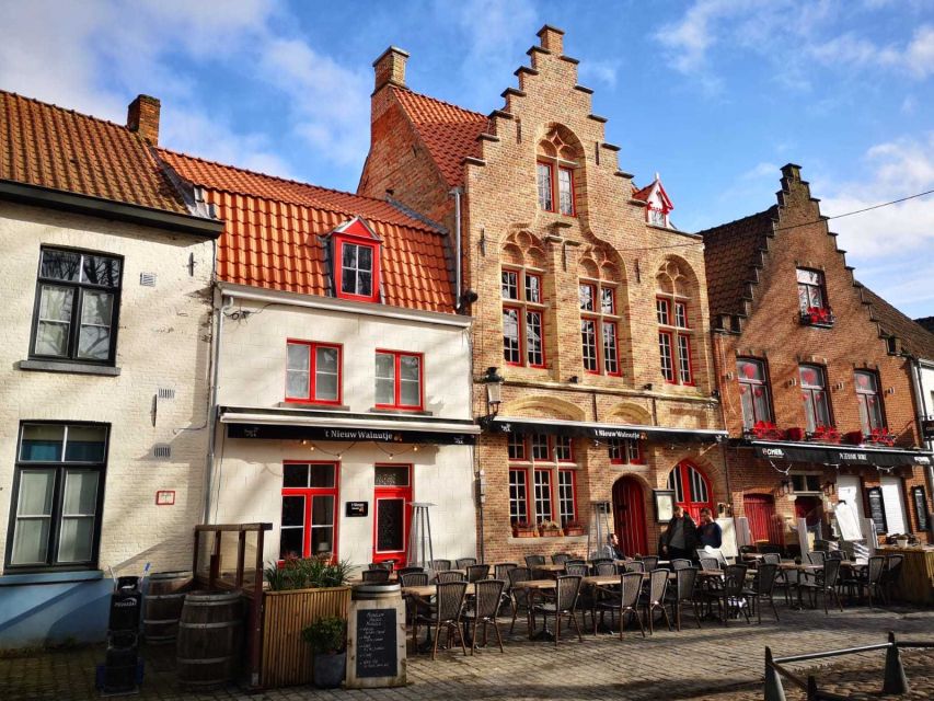 From Brussels: Bruges Day Trip with Boat Tour Option (ES) - Free time for lunch, chocolates, and the optional canal boat
