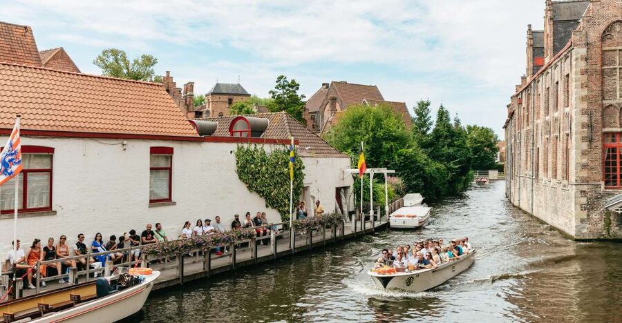 From Brussels: Guided Day Trip to Bruges and Ghent - Bruges first: canals, beguinage quiet, and medieval street theater